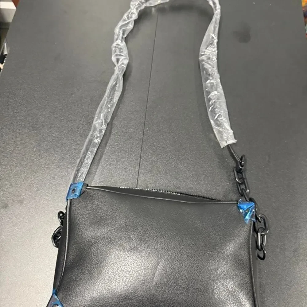 Black leather crossbody bag with chain strap